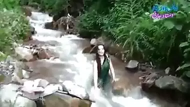 Desi girl in transparent wet saree showing boobs..hot show