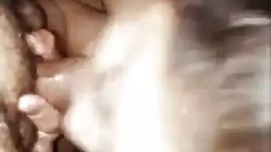 Indian mature wife giving blowjob to young